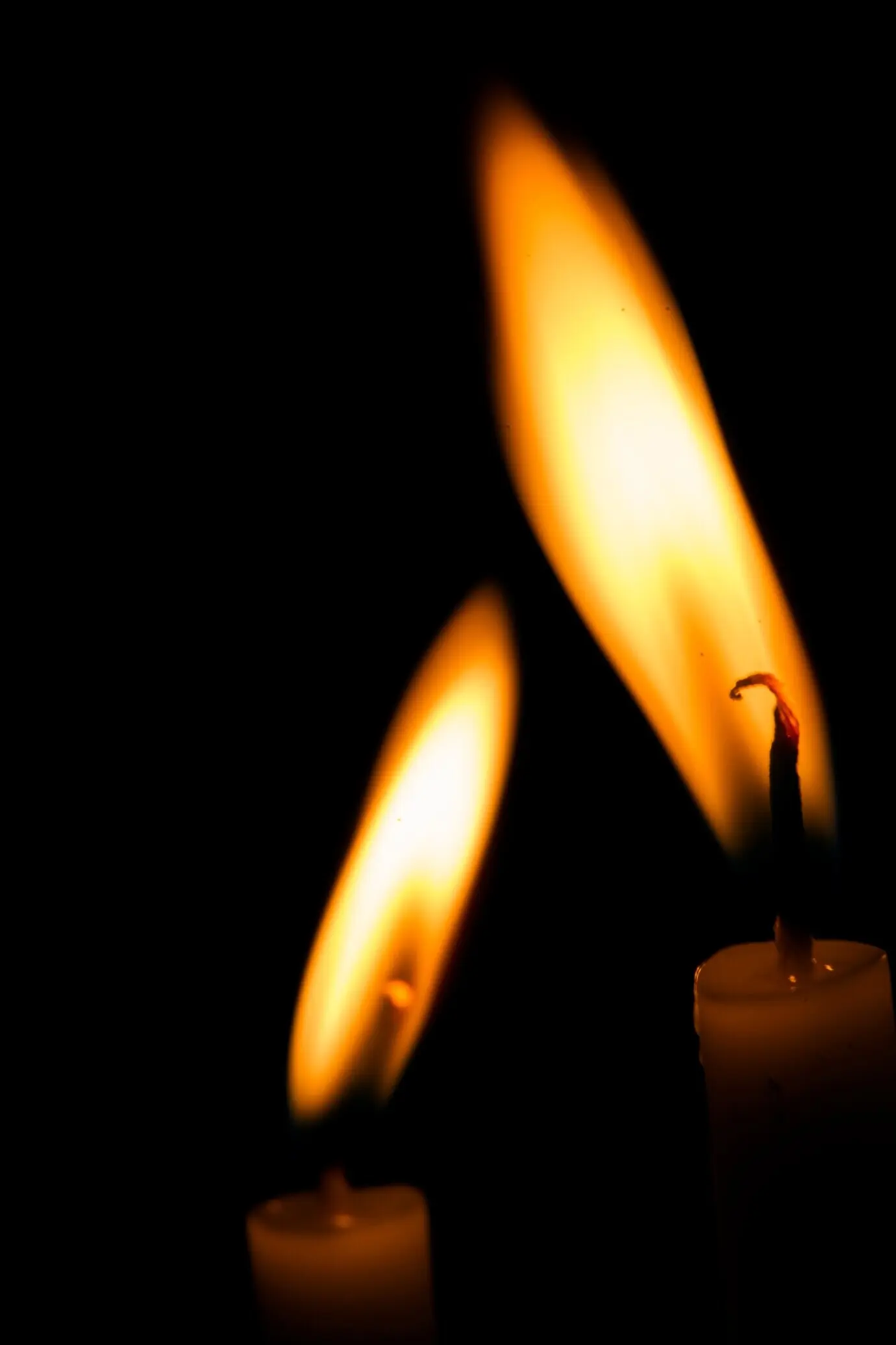Two burning candles